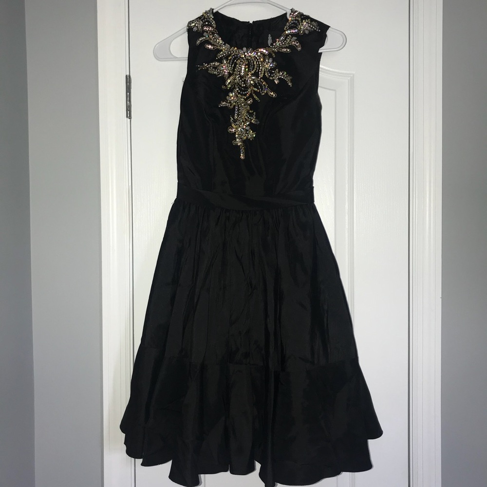 super cute black dress w cold jewls